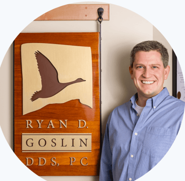 picture of Dr. Goslin next to his sign