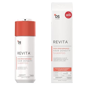 a bottle of revitalment hair shampooe
