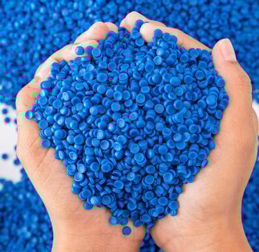 a person holding a heart shaped object in their hands