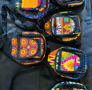 a group of colorful bags with a variety of different designs