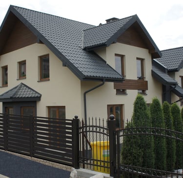 a house with a fenced in area with a fenced in area