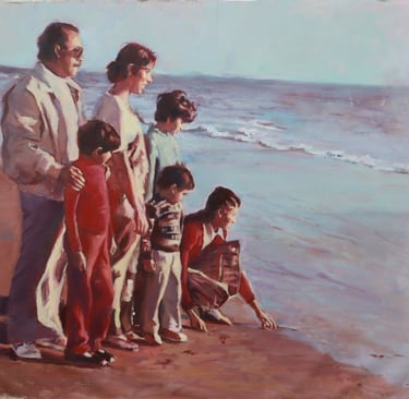 a little boy and his family on the beach for the first time 