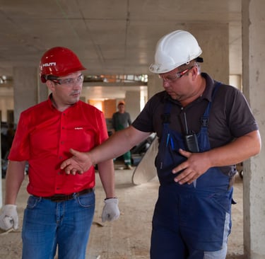An inspector training another inspector.