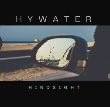 Hindsight single cover. A car mirror with a reflection of a tree in the background
