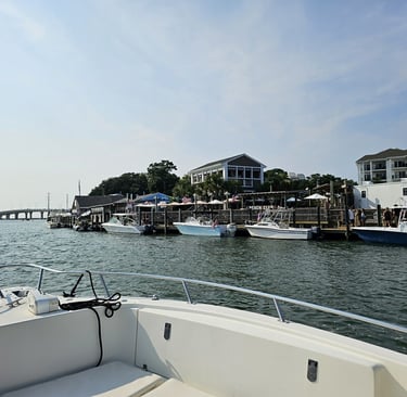 Boat view of Chicks Oyster Bar and boats in the Lynnhaven Inlet, Virginia Beach
