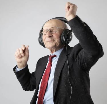 a man in a suit and tie with headphones