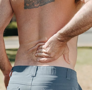 a man with a tattoo on his back