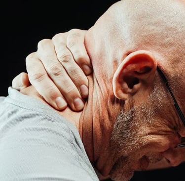 a bald balding man with glasses and a white shirt
