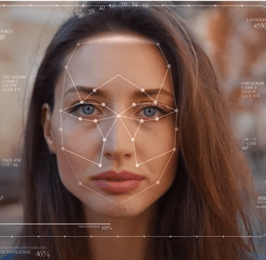 a woman with a facial recognition system on her face