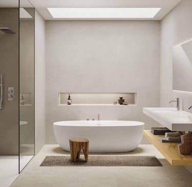 Moderne badkamer met ligbad en lavabo, gerealiseerd door bij een badkamerrenovatie regio Leuven