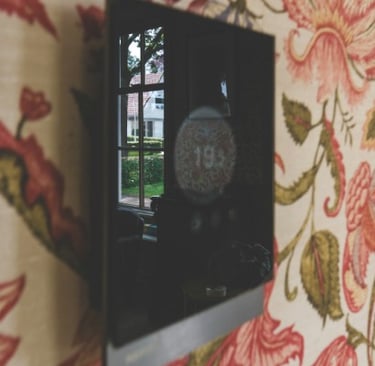 Moderne kamerthermostaat voor het regelen van de verwarming in een woning in regio Leuven en Tienen