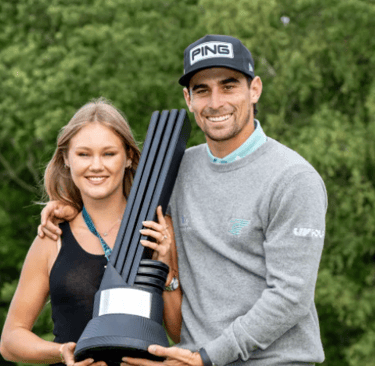 Joaquin Niemann and his wife celebrate victory at LIV Golf UK (photo: LIV Golf)