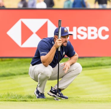 Bryson DeChambeau reads a putt in front of an HSBC sign at a LIV Golf event (Credit: LIV Golf)