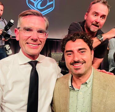 With Dominic Perrottet