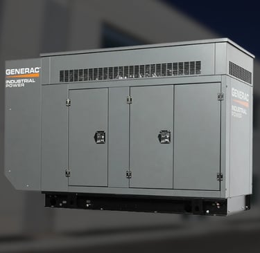 Industrial size generac generator with a blurred image of a industrial building in the background
