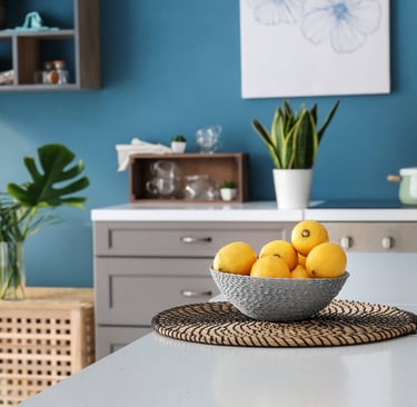 a bowl of lemonade and lemonade on a table