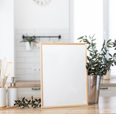 a picture frame with a picture frame and a plant in a potted potted