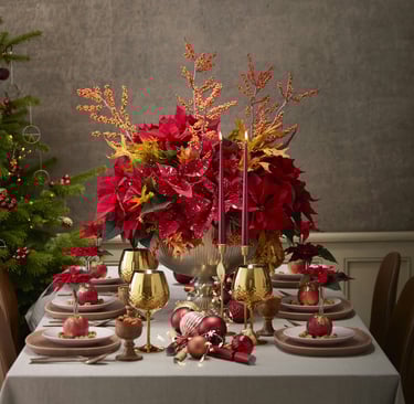 a table with a christmas tree and a christmas tree