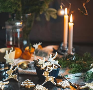 a table with cookies and candles on it