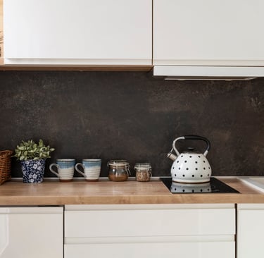 a kitchen with a kettle kettle kettler and a tea kettle