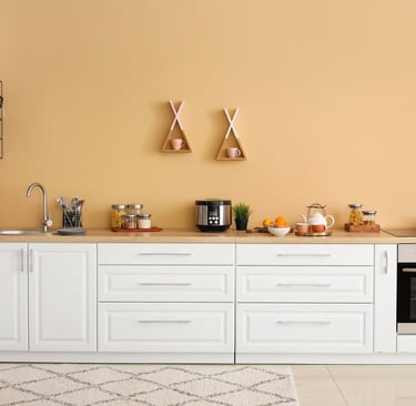 a kitchen with a stove top oven and a microwave