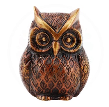 a decorative owl figurine with a gold colored brass owl