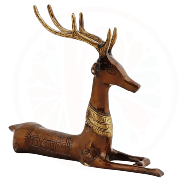 a deer statue of a deer with a gold collar