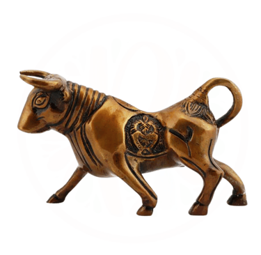 a bronze bull with a brown and black bull on it