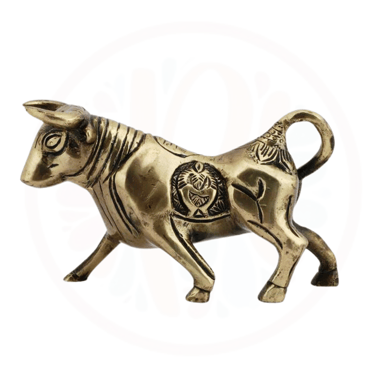 a gold bull statue of a bull in a circle