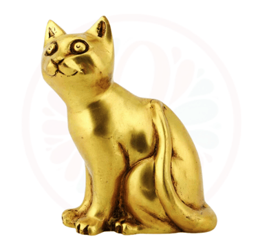 a gold cat statue of a cat