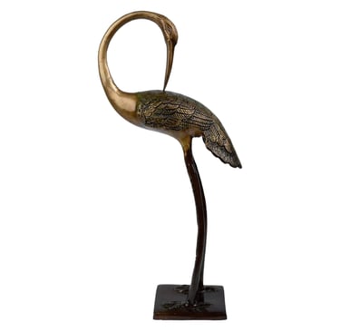 a bronze bird brass