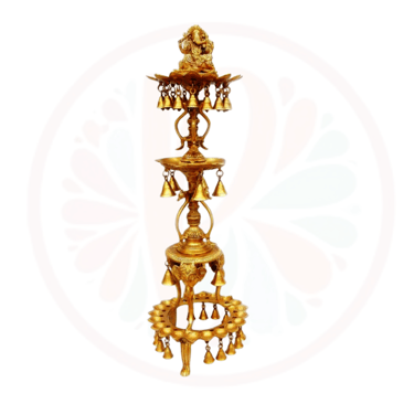 a tall brass bellows with bells and bells