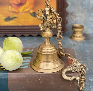 Hanging bell made in brass.