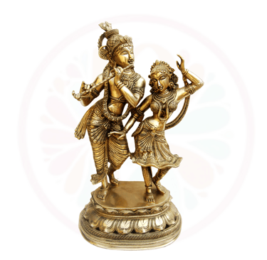 a bronze statue of a couple dancing