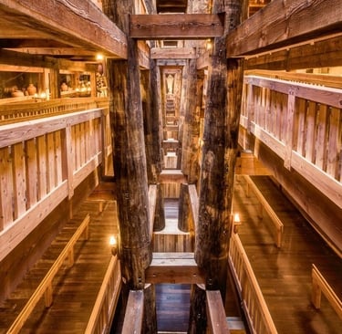 a wooden structure with wooden beams