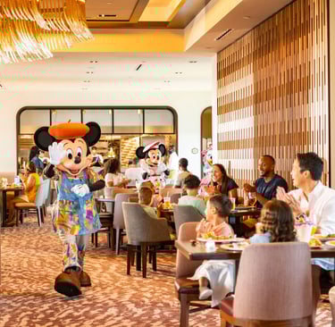 a mickey mouse character in a restaurant