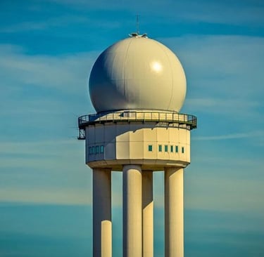 a large white dome shaped radar