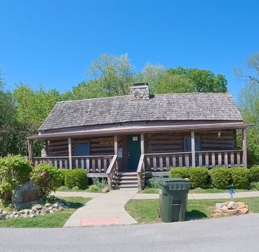 a log cabin visitor center