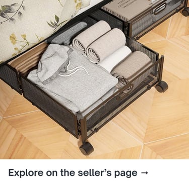 Metal under-bed storage drawer neatly filled with folded clothes and linens