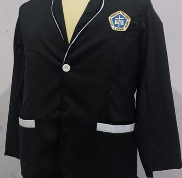 Black formal school uniform blazer with white trim and embroidered patch on a mannequin.
