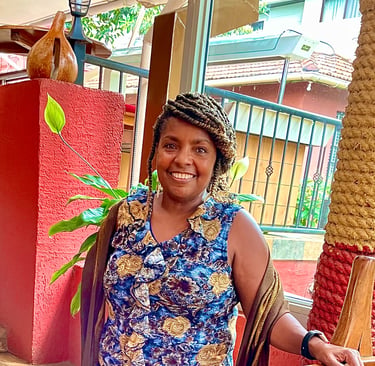 Chinwe O., founder of Bonya Books and retired reading specialist, smiling warmly