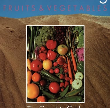 Book cover for Desert Gardening Fruits and Vegetables guide by George Brookbank featuring fresh produce.