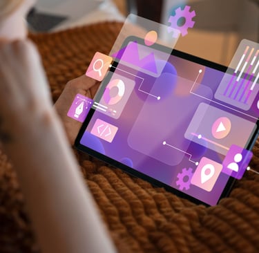 Pessoa olhando para a tela de um tablet com diversos gráficos