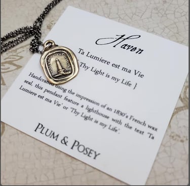 Lighthouse at night symbolizing editorial guidance and clarity.