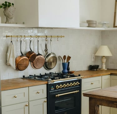 Upmarket kitchen with black and gold luxury oven