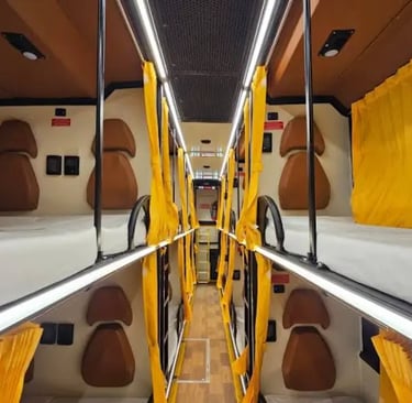 sleeper bus interior with comfortable berths for night travel in Delhi NCR