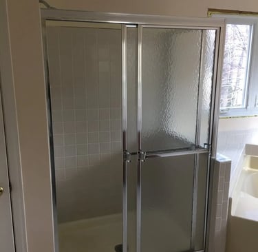 outdated walk-in shower.