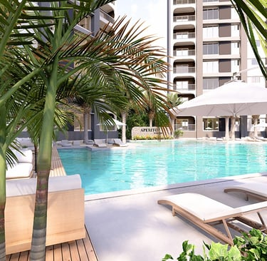 Relaxing outdoor swimming pool with sun loungers at Aperito Tower Clark