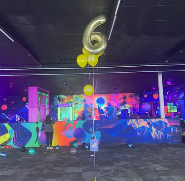 Children celebrating a birthday party in the arcade at Yum Yum Fun, Luzerne County