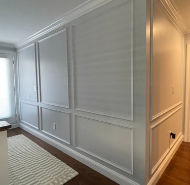 Architectural wall panels bring depth and balance to stairways, foyers, and entry walls.